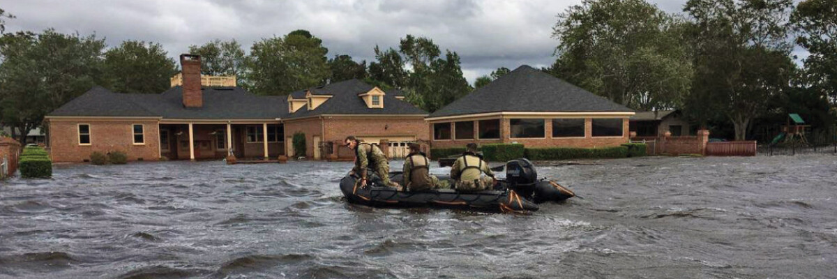 Florida National Guard in a boat respond to flooding in Ortega Jacksonville from Hurricane Irma.