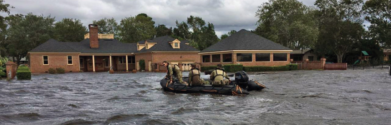 Florida National Guard in a boat respond to flooding in Ortega Jacksonville from Hurricane Irma.