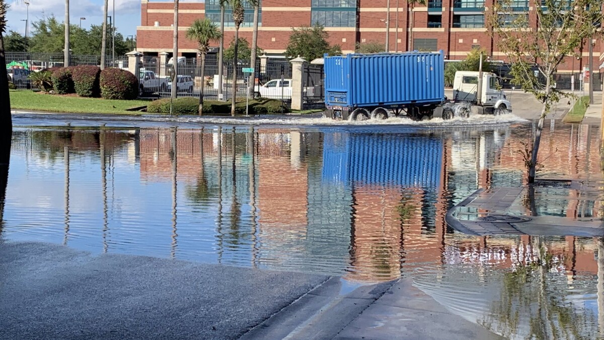 Hogan Creek spills over into the streets of Downtown Jacksonville as a storm passes offshore in November of 2019.