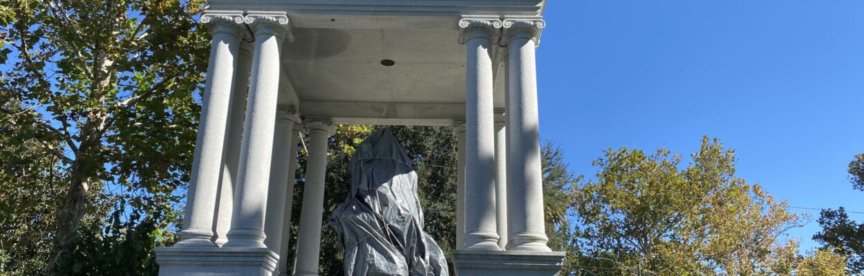 Springfield park monument covered in a tarp