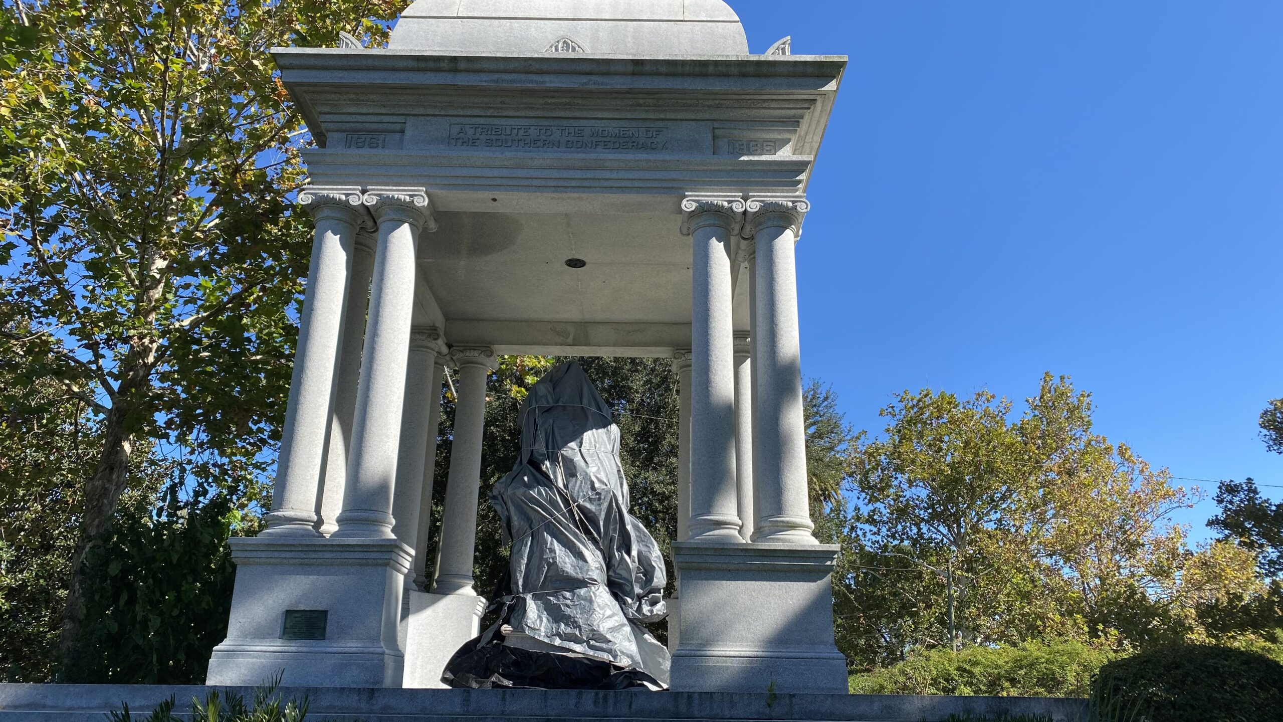 Springfield park monument covered in a tarp