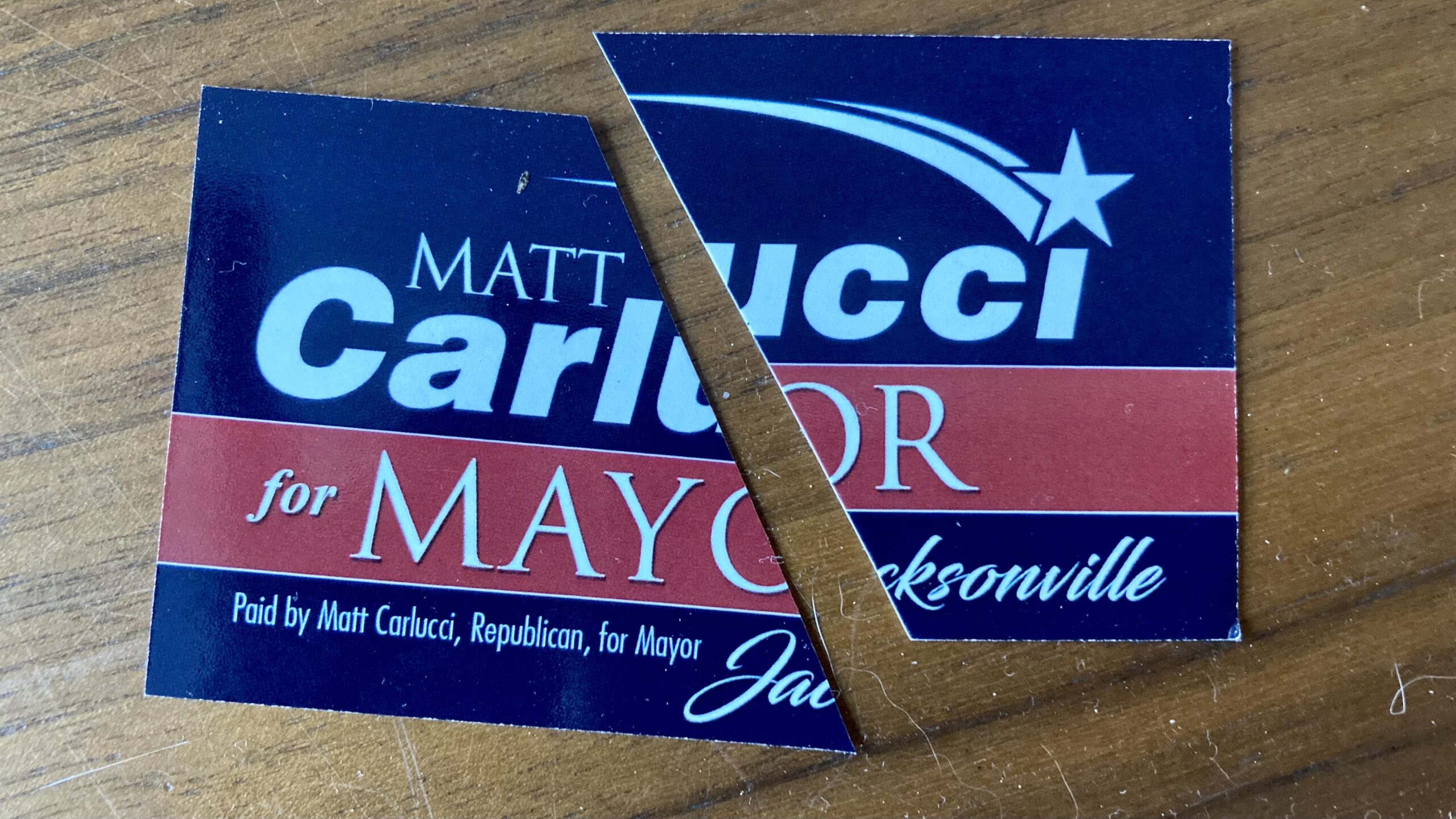 Carlucci for mayor card cut in half
