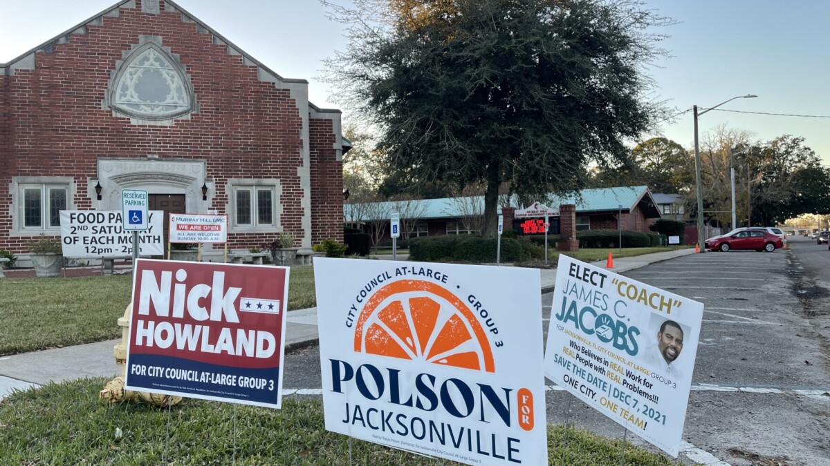 Signs in front of an early voting site