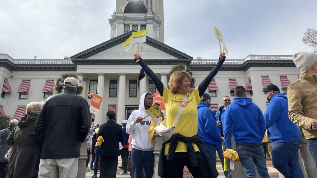 Raina Greenfest (in yellow) in front of the Florida capitol. | Courtesy BayWa r.e.