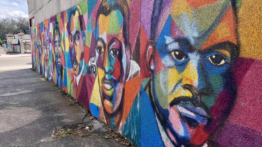 The Locals and Legends mural can be found on the corner of A. Philip Randolph Blvd. and Pippin St. in Jacksonville's Eastside. Credit: Lindsey Kilbride, WJCT News