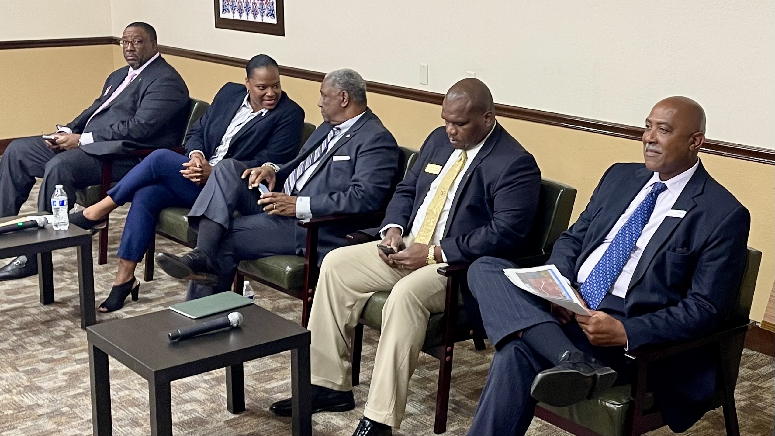 The five Jacksonville Sheriff's candidates sitting in a row.