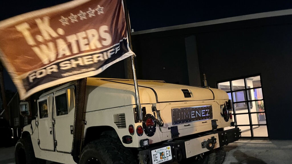 Waters had a military tank with his campaign flag outside his Election Day watch party.