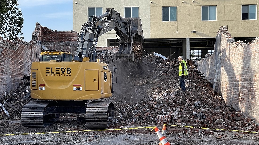 Featured image for “Crew demolishes Capt. Sandy Yawn’s building in LaVilla”