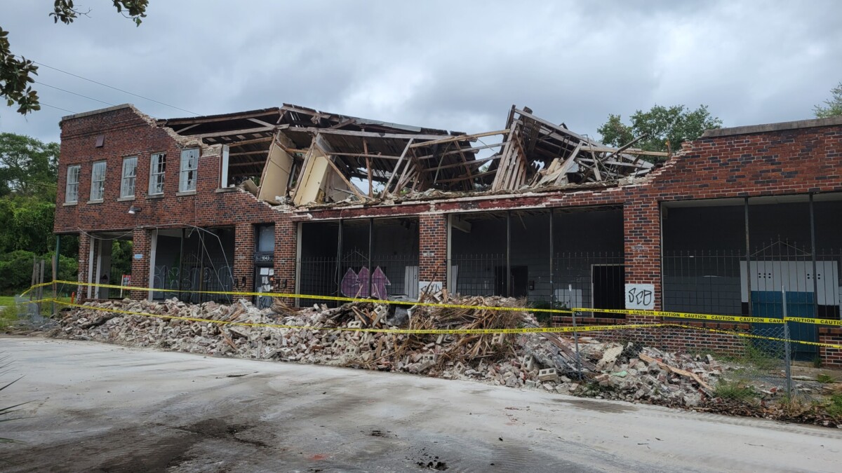 The second floor of a 1904-era building collapsed at East 1st and Walnut streets on Wednesday, Aug. 30, 2023.