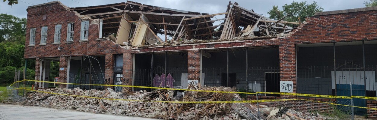 The second floor of a 1904-era building collapsed at East 1st and Walnut streets on Wednesday, Aug. 30, 2023.