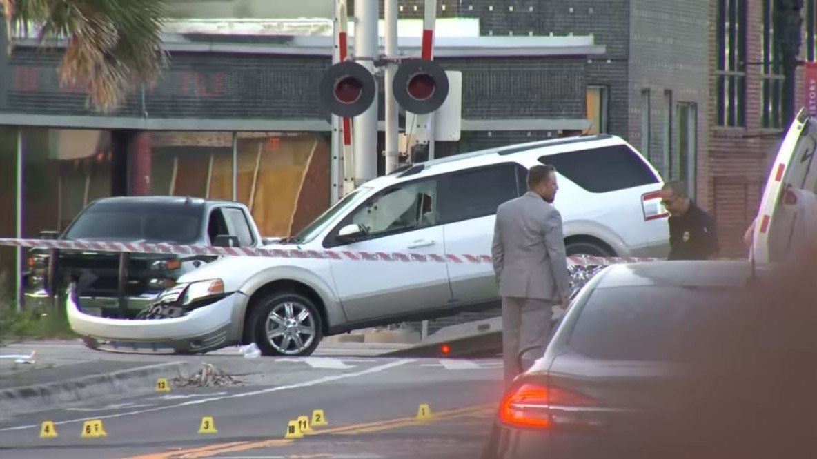 This SUV hit a passing train in San Marco after the woman driving it was shot to death.