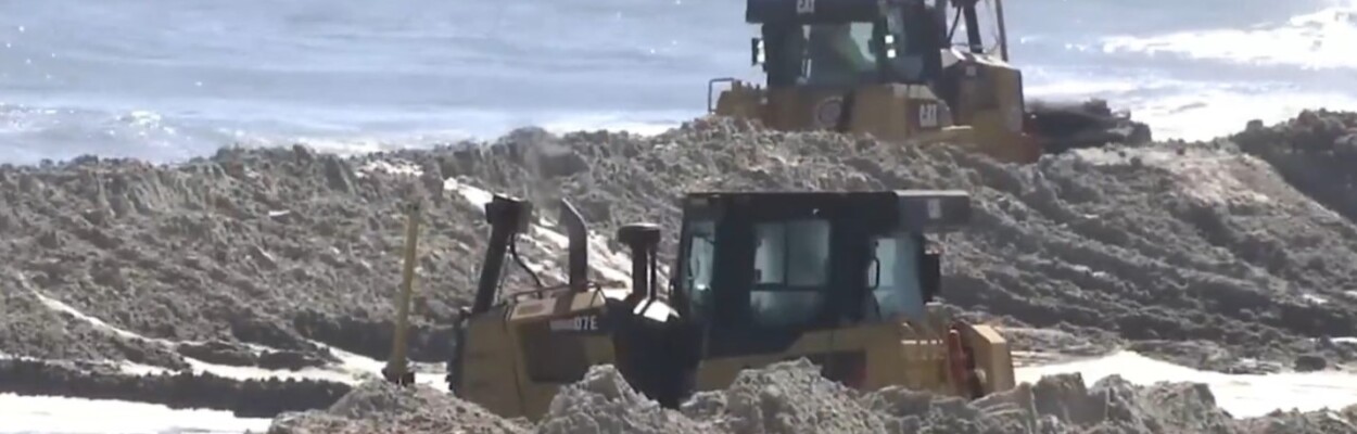 Bulldozers build up part of Vilano Beach during a renourishment project in 2021. | News4Jax