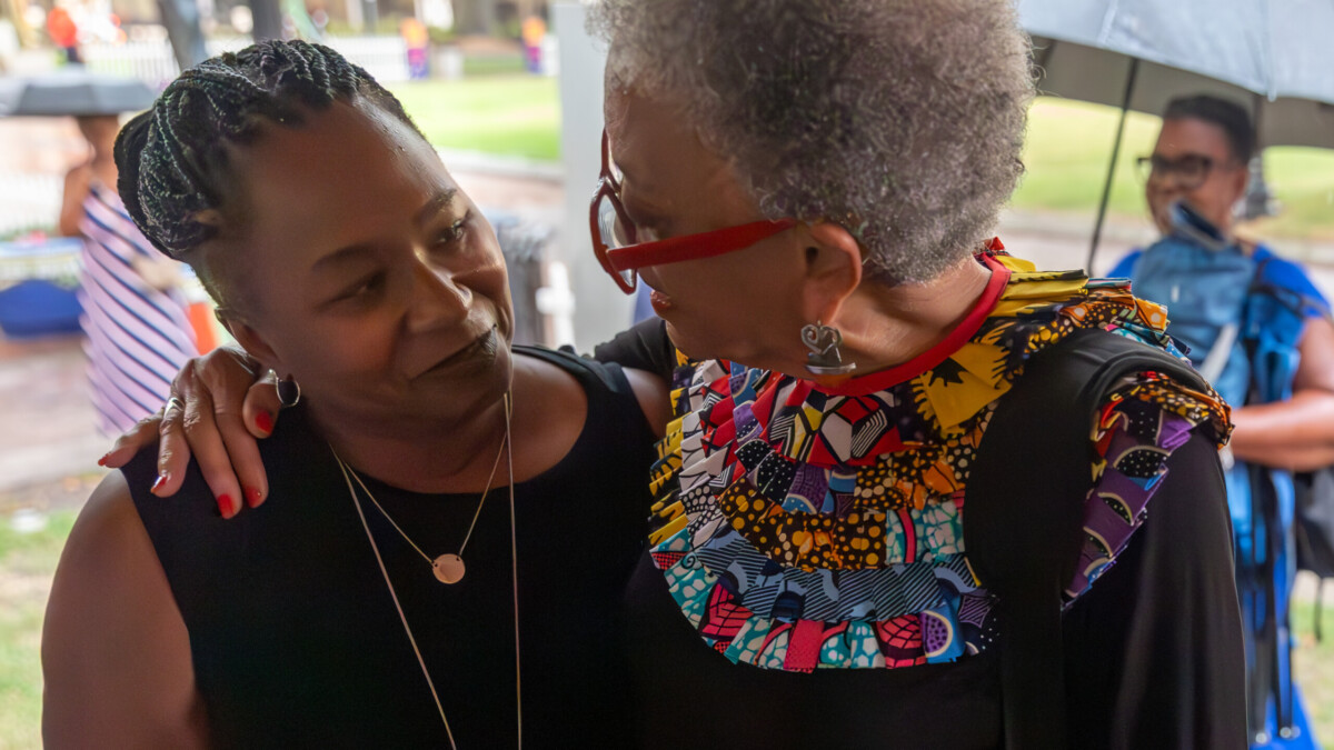 Diana Greene, left, speaks with Johnnetta Betsch Cole after a reading of banned and restricted books in James Weldon Johnson Park in Jacksonville. Cole, an anthropologist and former president of Spelman College and Bennett College, is a Jacksonville native. Greene, CEO of the Children's Literacy Initiative, is the former superintendent of Duval County Public Schools.