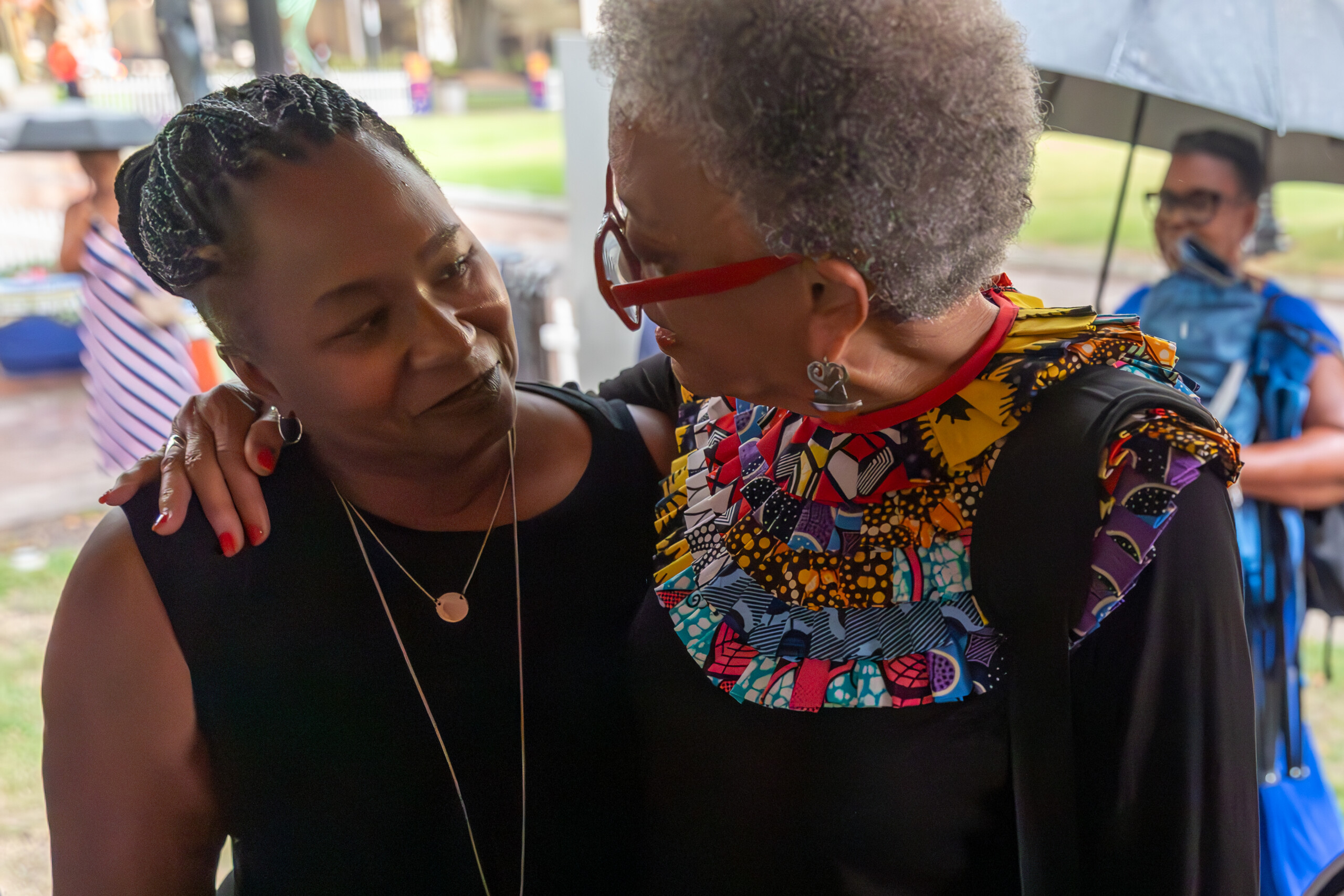 Diana Greene, left, speaks with Johnnetta Betsch Cole after a reading of banned and restricted books in James Weldon Johnson Park in Jacksonville. Cole, an anthropologist and former president of Spelman College and Bennett College, is a Jacksonville native. Greene, CEO of the Children's Literacy Initiative, is the former superintendent of Duval County Public Schools.