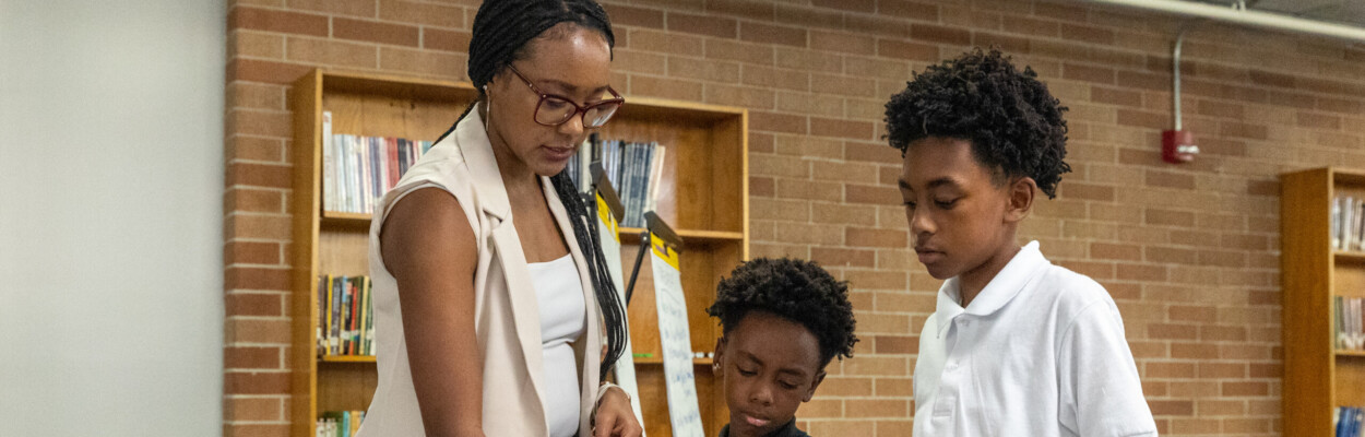 Janee White Sapp and her sons identify the top qualities they would like to see in the next Duval County Schools superintendent. They attended a community forum Wednesday, Sept. 6, 2023, at Raines High School.