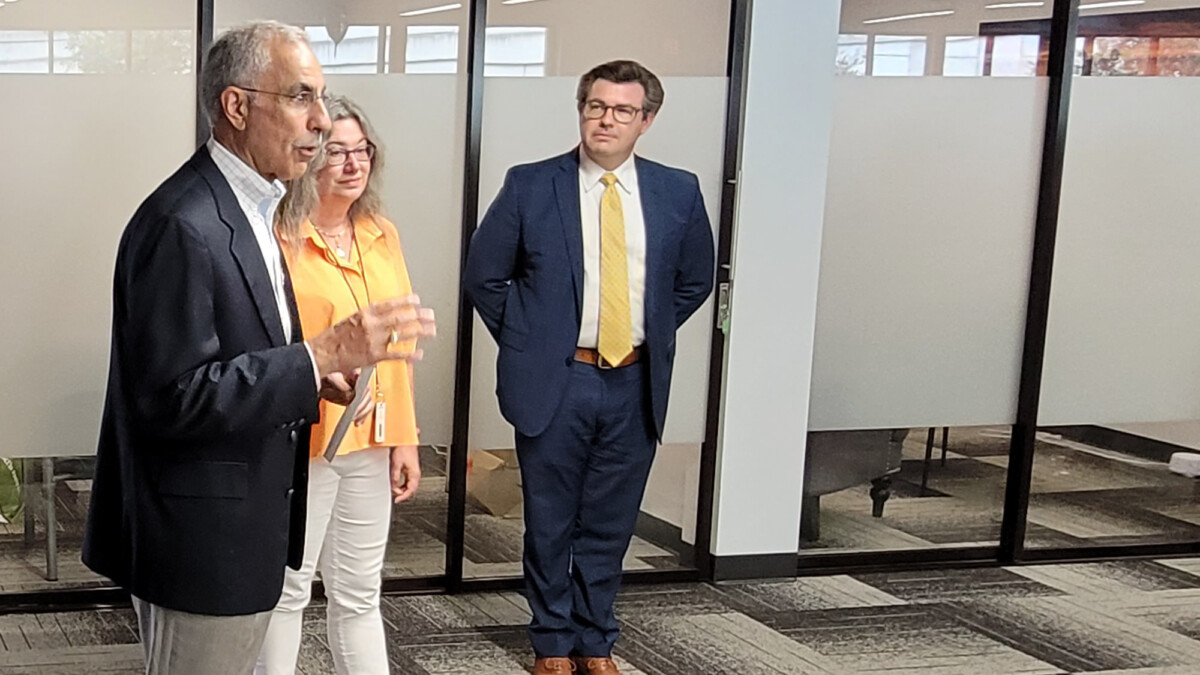 City Council President Ron Salem, left, discusses the issue of first-time homelessness in Jacksonville on Friday, Sept. 1, 2023. Changing Homelessness CEO Dawn Gilman and board Chairman Brad Russell listen.