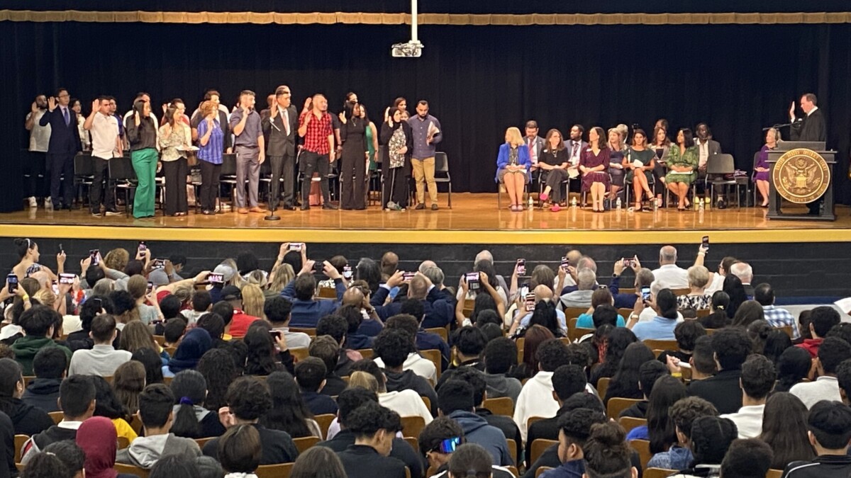 Thirty-five people became US citizens Friday during a ceremony at Englewood High School in Jacksonville