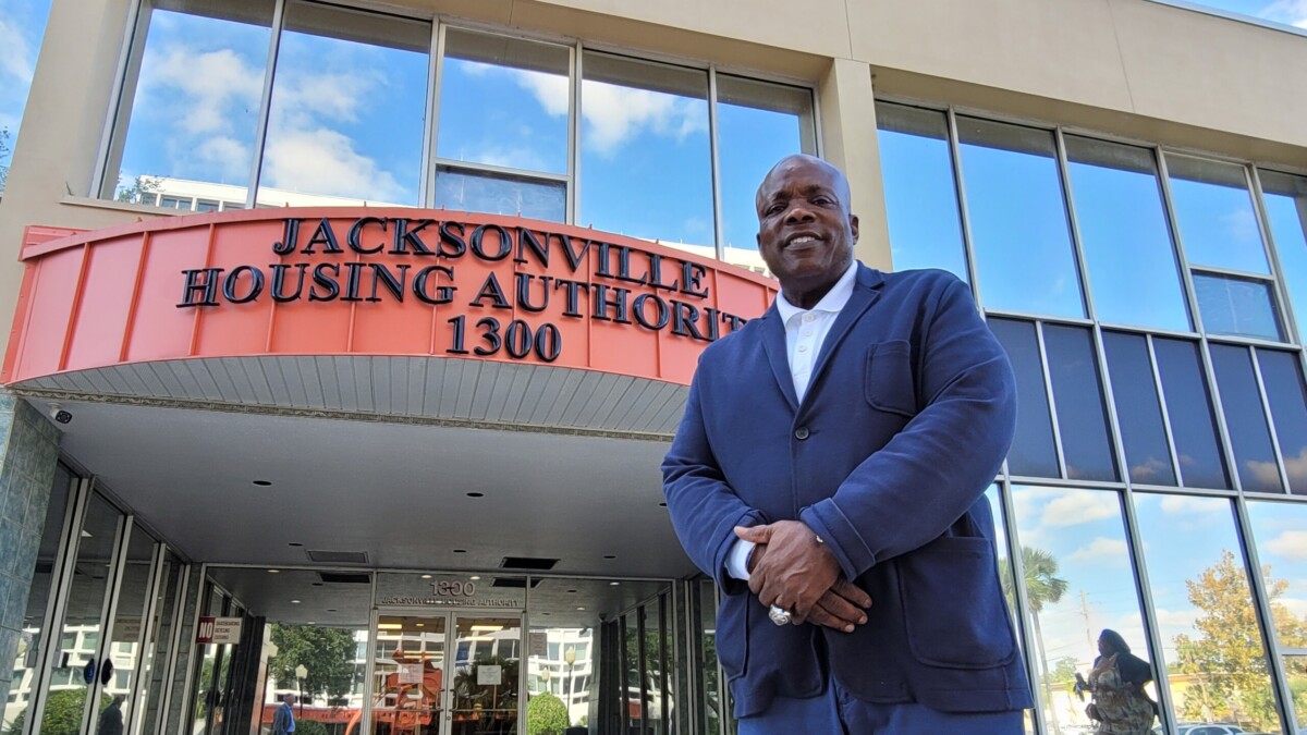 Dwayne Alexander stands outside the entrance to the Jacksonville Housing Authority, which he resigned from recently. The agency is on the hunt for a new CEO. | Jacksonville Today, Casmira Harrison