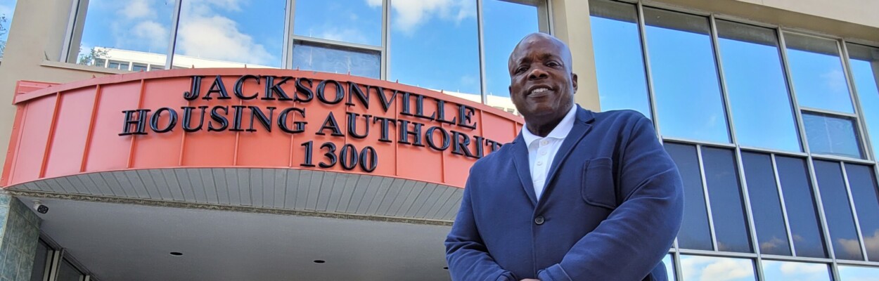 Dwayne Alexander stands outside the entrance to the Jacksonville Housing Authority, which he resigned from recently. The agency is on the hunt for a new CEO. | Jacksonville Today, Casmira Harrison