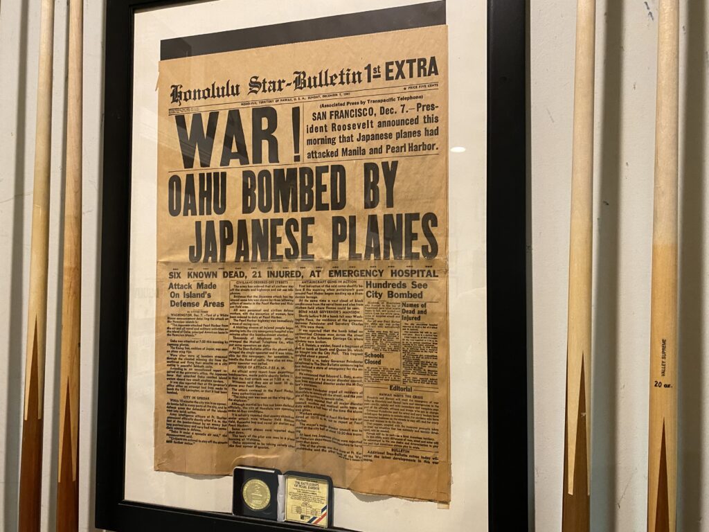 A copy of a newspaper from Hawaii on the day of the Pearl Harbor attack hangs in a room at the Fleet Reserve Branch 290 in Atlantic Beach l Steven Ponson