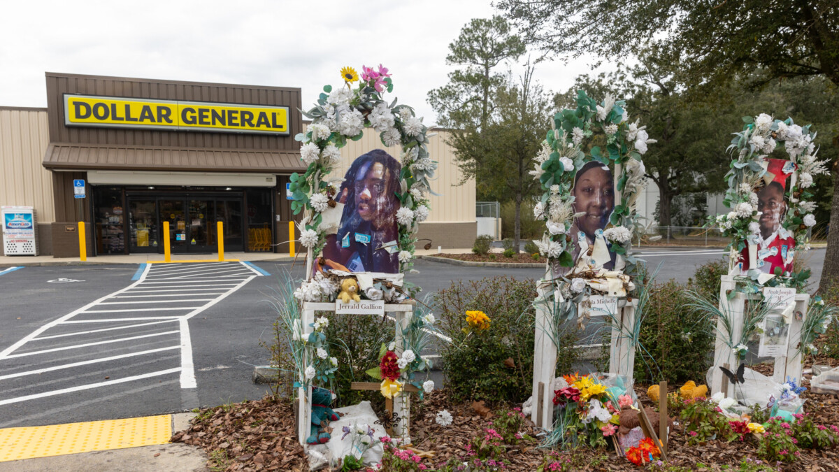 A makeshift memorial outside Dollar General honors the three people killed there Aug. 26, 2023, in a racist shooting. | Will Brown, Jacksonville Today
