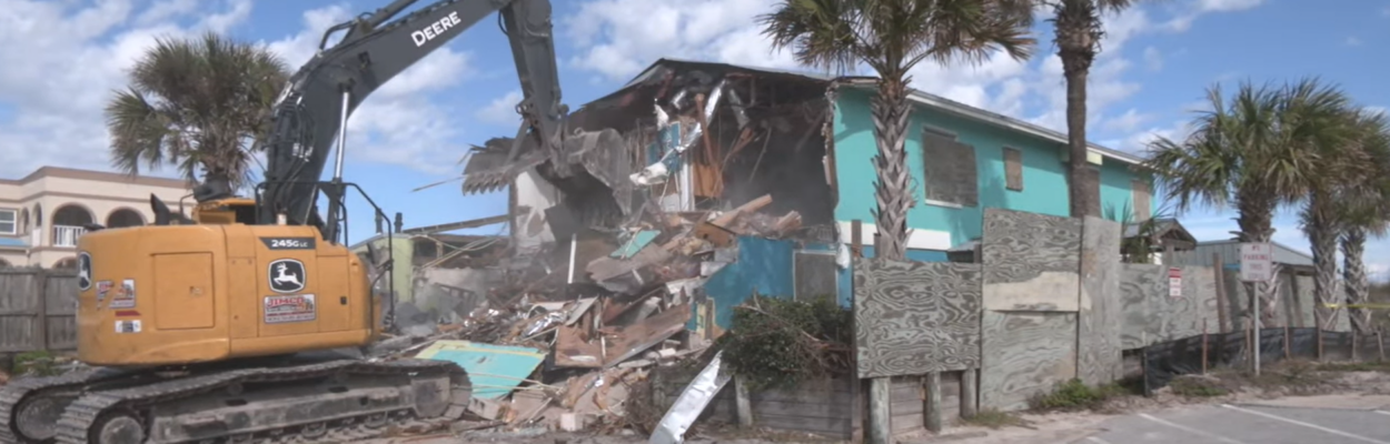 Crews are demolishing the old South Beach Grill restaurant in Crescent Beach to make way for a new beach walkover and parking.