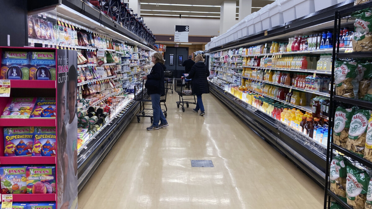 Customers shop at a grocery store in Mount Prospect, Ill., Friday, April 1, 2022. | Nam Y. Huh, AP