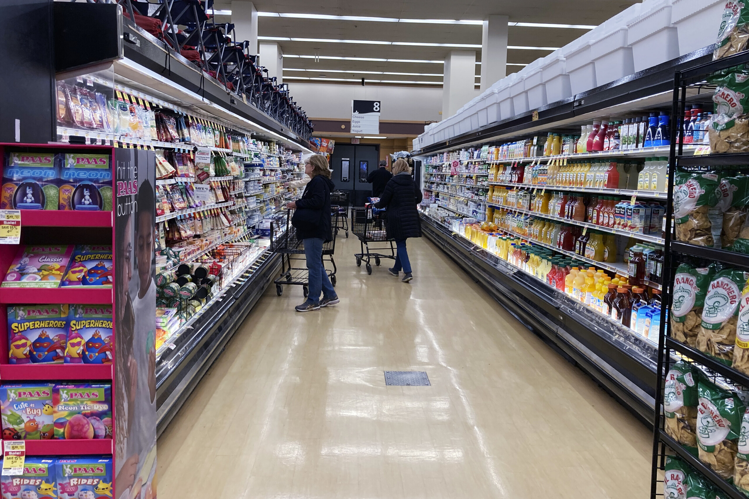Customers shop at a grocery store in Mount Prospect, Ill., Friday, April 1, 2022. | Nam Y. Huh, AP