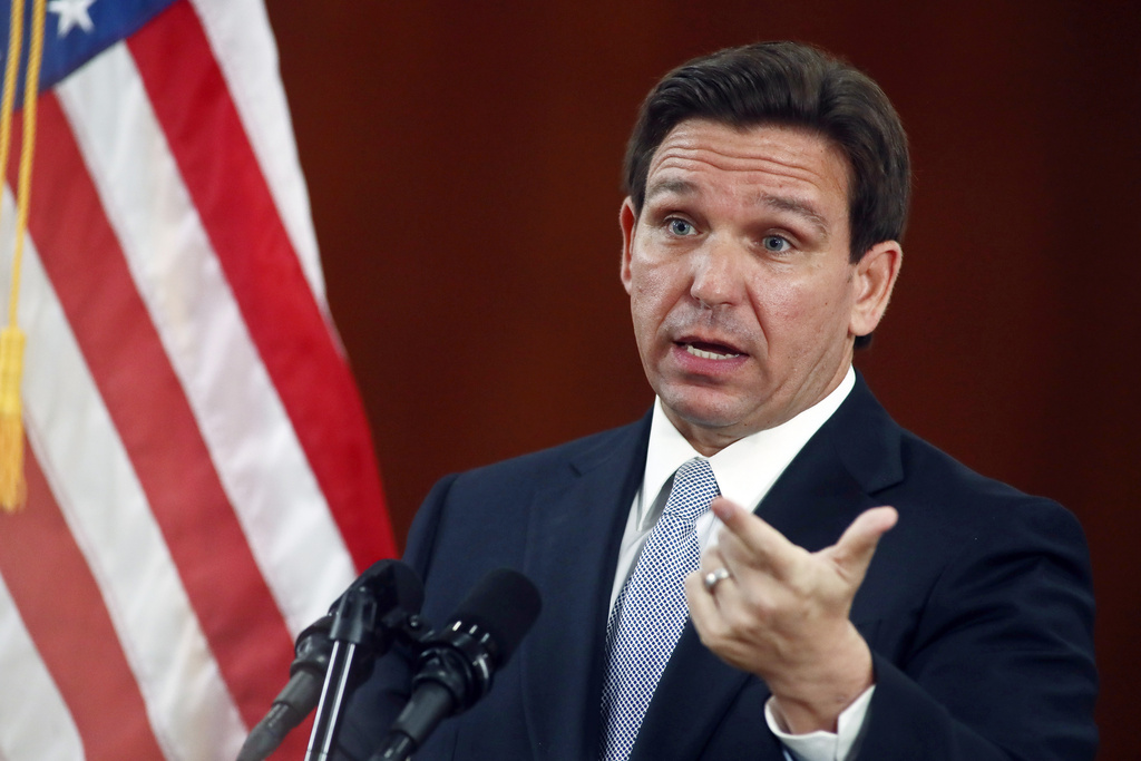 Featured image for “Battle heats up over DeSantis’ travel records”