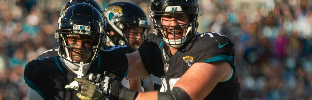 Jacksonville Jaguars offensive guard Walker Little (72) celebrates with running back Tank Bigsby (4) after a first down against the Tennessee Titans on Nov. 19, 2023. | Will Brown, Jacksonville Today