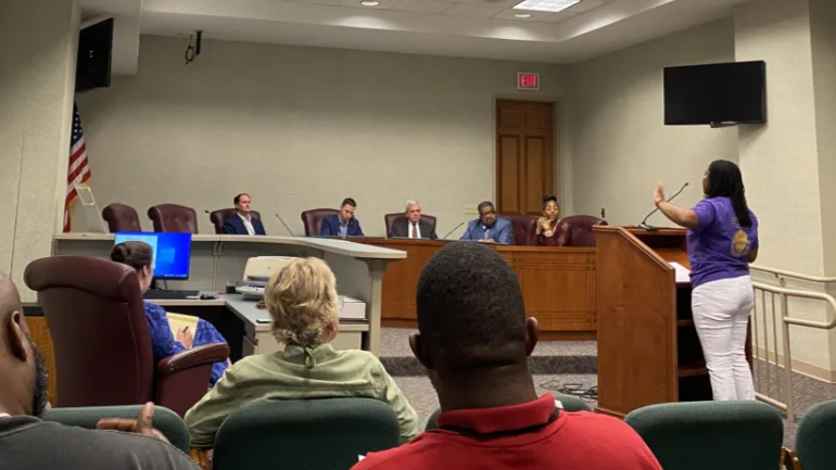 Temisha Hill, president of Unified Community Investors, gives her opinion on Tuesday, Feb. 27, 2024, about a planned resolution to condemn historic redlining. She described deeper problems she says permeate her community due to generational housing discrimination. | The Tributary