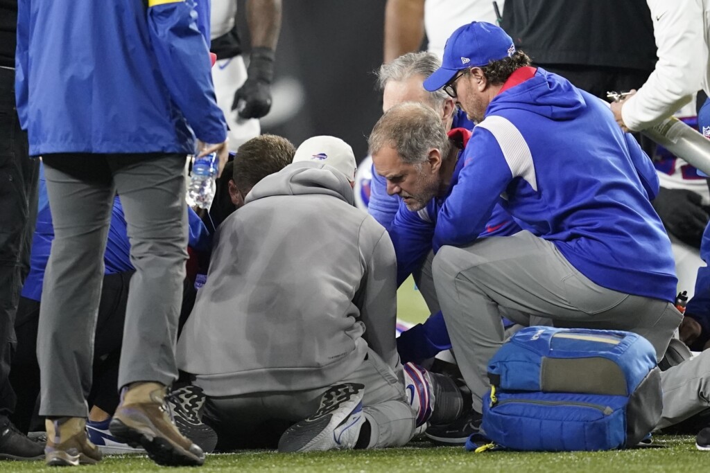 Damar Hamlin of the Buffalo Bills is examined during the first half of an NFL football game against the Cincinnati Bengals on Jan. 2, 2023, in Cincinnati. The game was postponed after Hamlin collapsed. | Joshua A. Bickel, AP