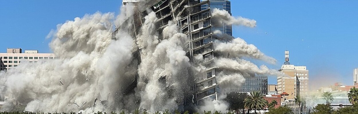 The Berkman Plaza II high-rise is imploded March 6, 2022.