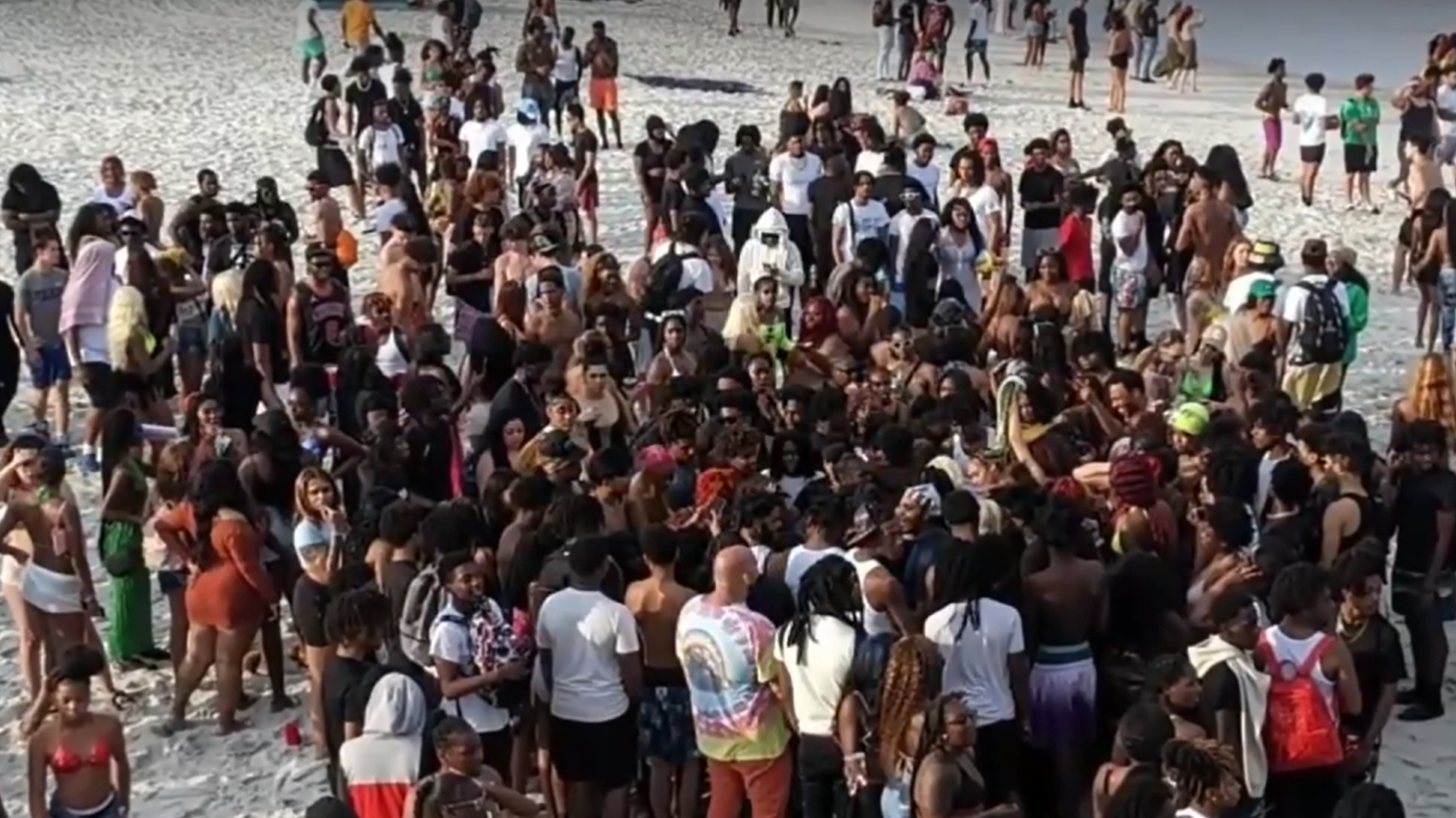 A crowd packs Jacksonville Beach on Sunday, March 17, 2024. | News4Jax