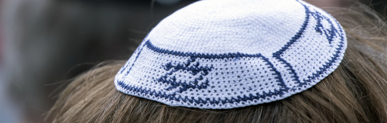 People of different faiths wear the Jewish kippah during a demonstration against anti-Semitism in Germany in April. | Jens Meyer, AP