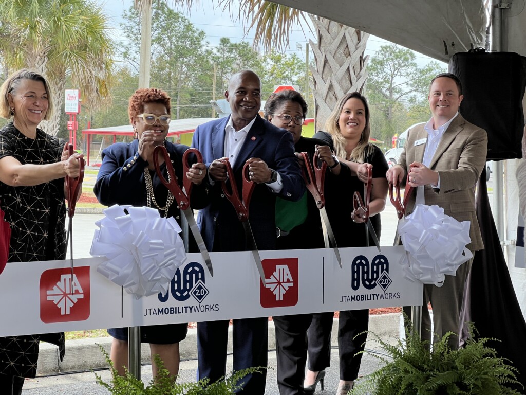 Jacksonville Transportation Authority CEO Nat Ford (center) and other leaders cut a ceremonial ribbon during the conference, but said work has already started. | Carter Mudgett, Jacksonville Today