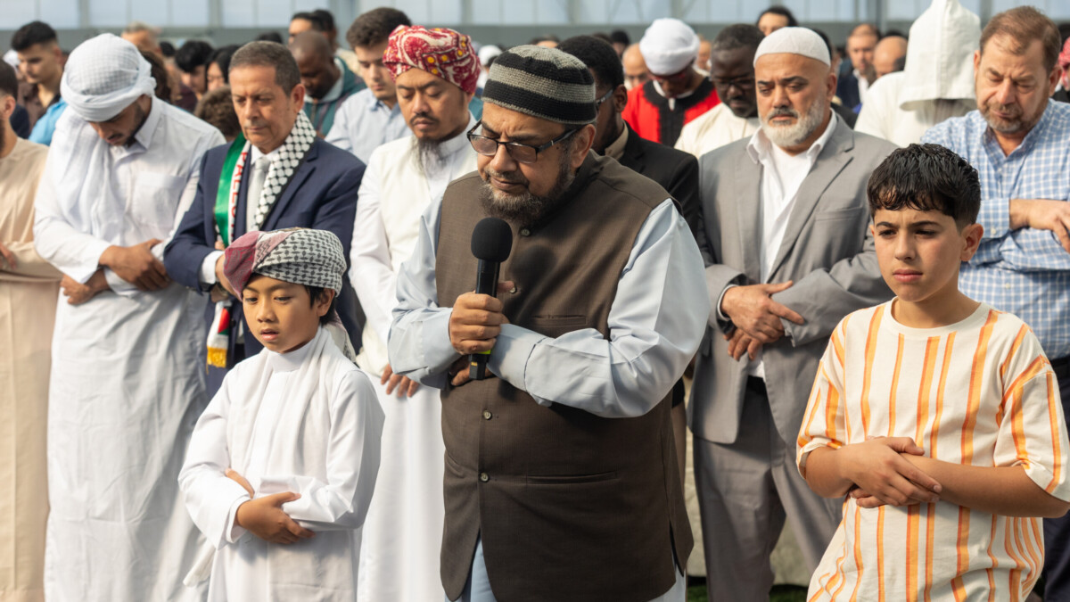 Imam Bilal Malik leads an Eid al-Fitr prayer. An estimated 7,000 people gathered inside Dream Finders Homes Flex Field at Daily’s Place for an Eid al-Fitr celebration on Wednesday, April 10, 2024. | Will Brown, Jacksonville Today
