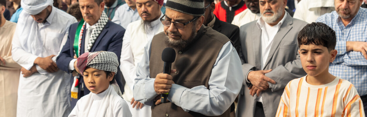 Imam Bilal Malik leads an Eid al-Fitr prayer. An estimated 7,000 people gathered inside Dream Finders Homes Flex Field at Daily’s Place for an Eid al-Fitr celebration on Wednesday, April 10, 2024. | Will Brown, Jacksonville Today