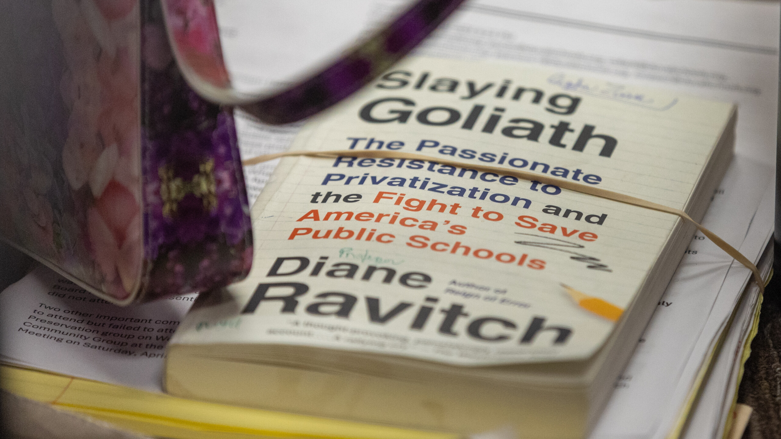 Longtime Atlantic Beach resident Carolyn Zisser brought Diane Ravitch's book "Slaying Goliath" with her to address the Duval County School Board on Tuesday, April 16, 2024. Zisser was among nearly a dozen people who implored the board to keep Atlantic Beach Elementary open. | Will Brown, Jacksonville Today