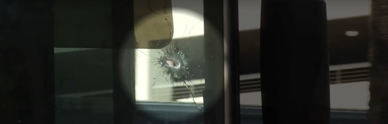 A bullet left a hole in the windshield of a school bus. | News4Jax