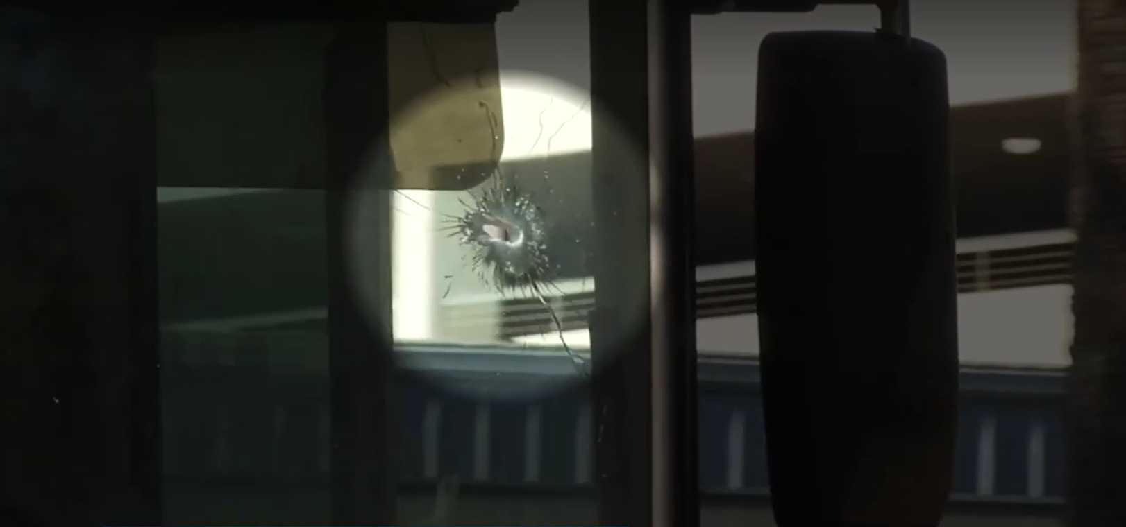 A bullet left a hole in the windshield of a school bus. | News4Jax