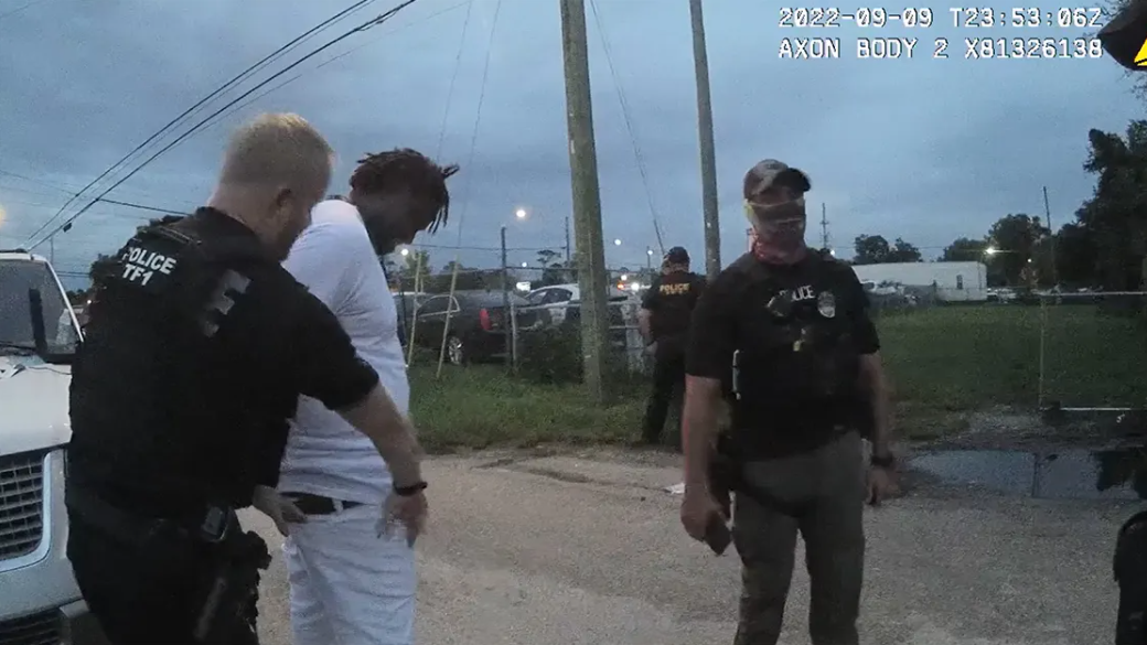 A screengrab from body-worn camera footage shows Jacksonville Sheriff’s Office police preparing to strip search Ronnie Reed. | Jacksonville Sheriff's Office