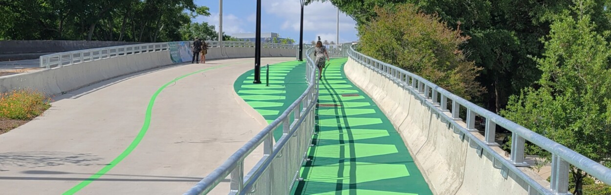 A walker strolls over part of the 1.3-mile LaVilla Link, just after it officially opened Monday, May 6, as the first leg of the planned 34-mile-long Emerald Trail in Jacksonville. | Dan Scanlan, Jacksonville Today