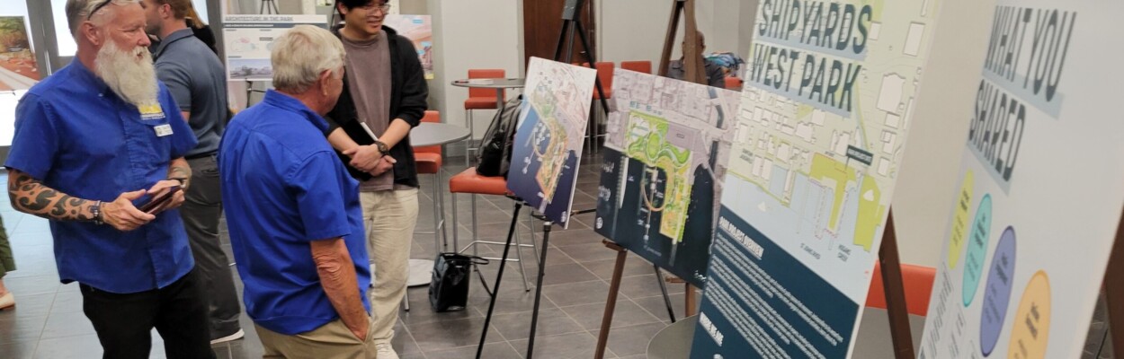 Senior volunteers from the USS Orleck maritime museum, on the west side of the planned Shipyards West Park, look at design drawings for the site. | Dan Scanlan, Jacksonville Today