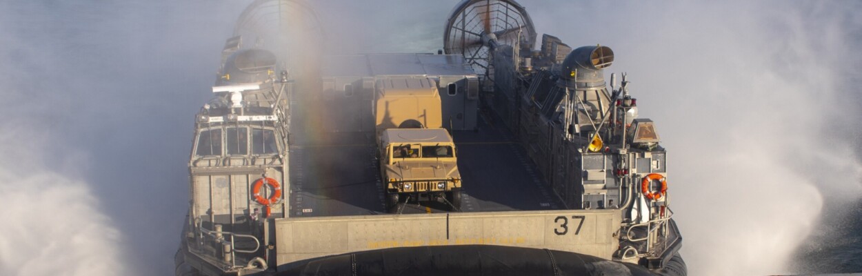 An air-cushioned landing craft prepares to enter the well deck of the amphibious transport dock ship USS New York in the Atlantic Ocean. l Navy Petty Officer 2nd Class Lyle Wilkie, US Navy.