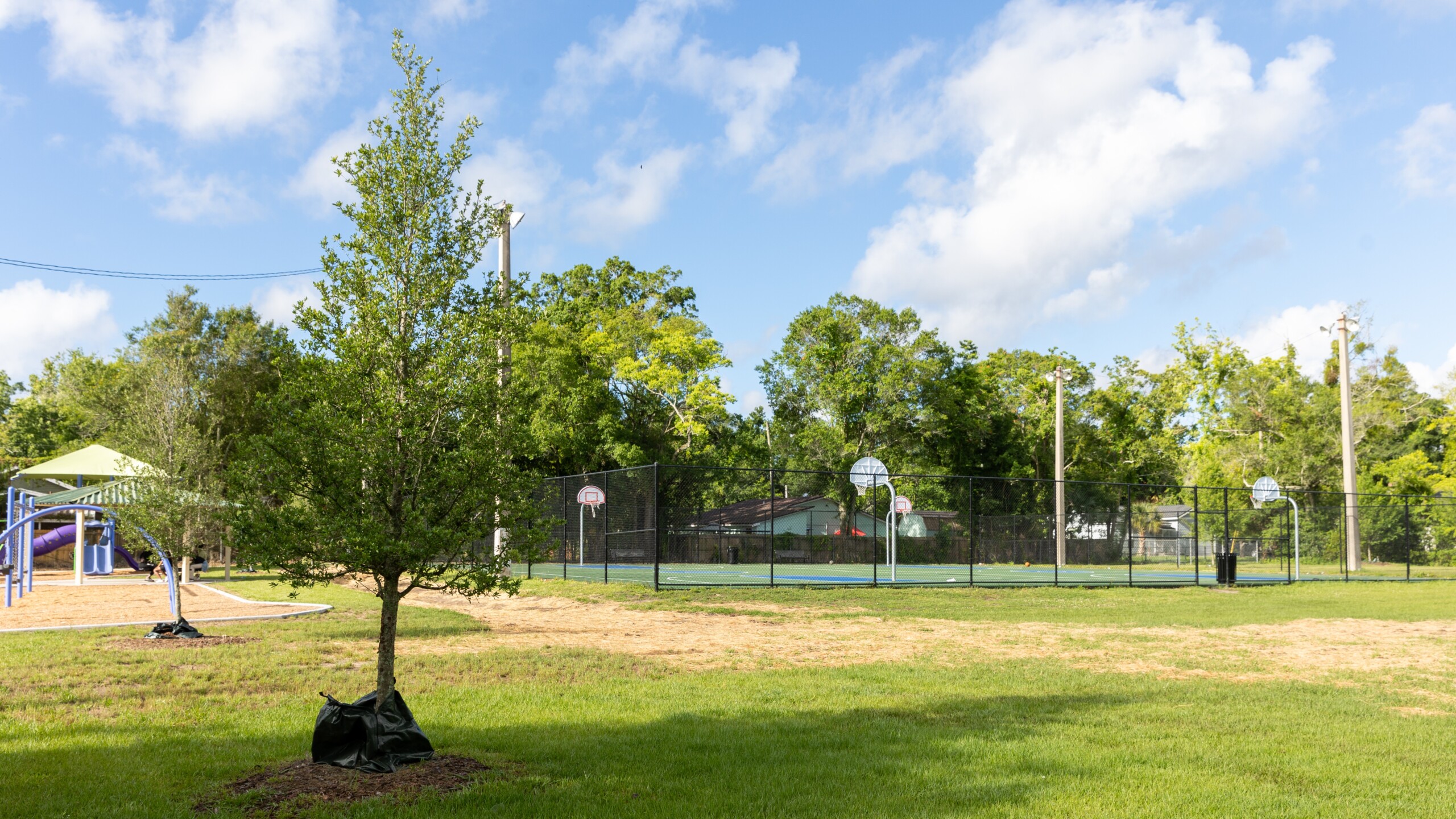 Grunthal Park in the Grand Park neighborhood was renovated in 2023 to convert tennis courts into basketball courts with a playground space. | Will Brown, Jacksonville Today