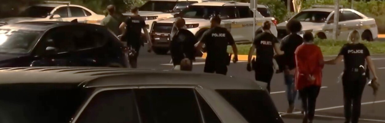 Jacksonville police officers lead away some of the 16 people arrested Thursday, May 2, 2024, during a pro-Palestine protest at the University of North Florida. | News4Jax