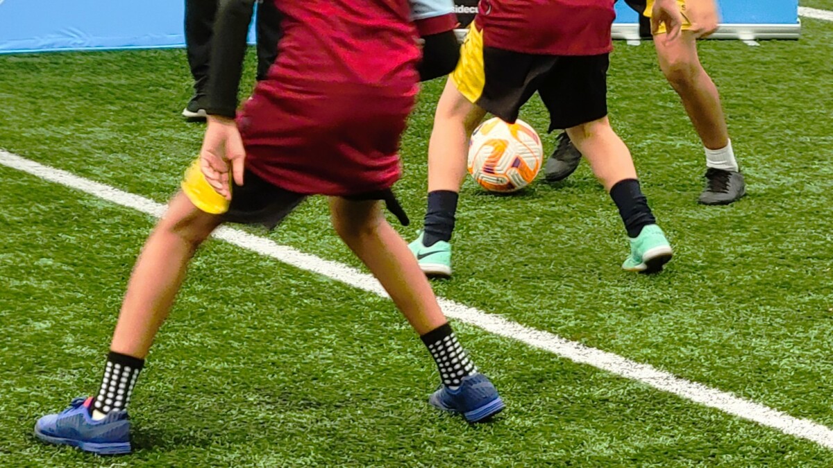 Members of the All Nations Soccer Academy play on Tuesday, June 25, 2024, at the Jacksonville Jaguars' flex field, where the youth clinic will be held in a month. | Dan Scanlan, Jacksonville Today