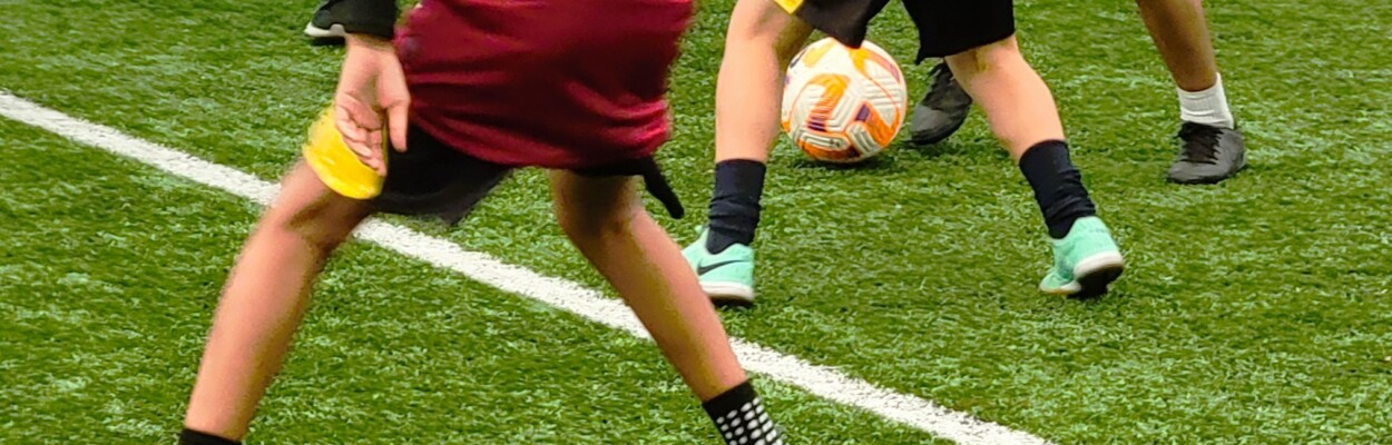 Members of the All Nations Soccer Academy play on Tuesday, June 25, 2024, at the Jacksonville Jaguars' flex field, where the youth clinic will be held in a month. | Dan Scanlan, Jacksonville Today