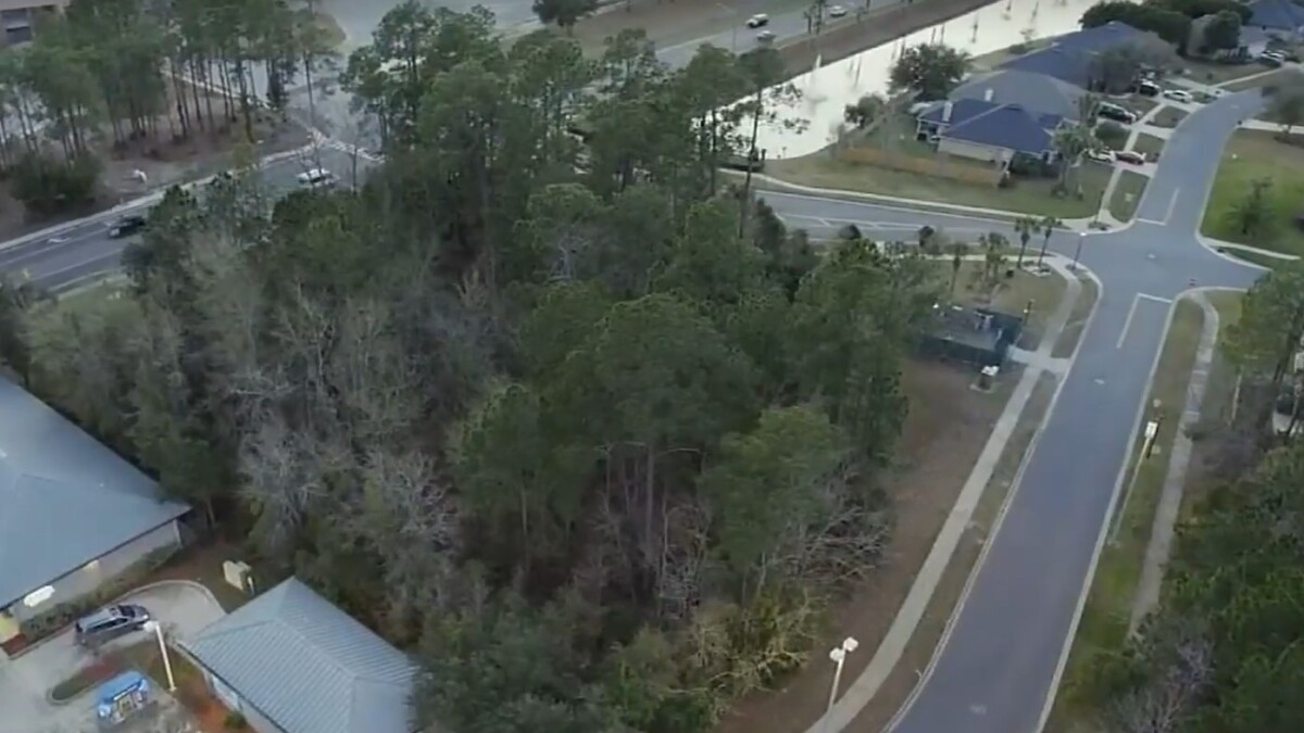 A controversial Chick-fil-A would be built on this land on Bradley Cove Road and Lady Lake Road. The site is next to the North Creek subdivision and across the street from First Coast High School. | News4Jax